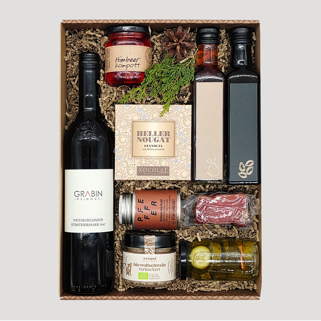 Exquisite Geschenkbox mit Wein, Wurst, Aufstrichen und Gewürzen – luxuriöse Gourmetbox von Adam Geschenke