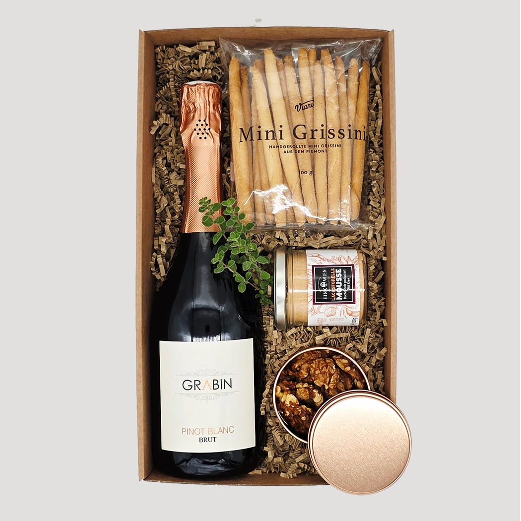 Prickelnde Geschenkbox mit Sekt, Mini-Grissini und Snacks – stilvolles Genusspräsent von Adam Geschenke