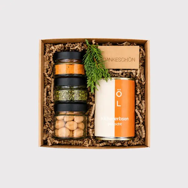 Geschenkbox „Fröhlich“ von Adam Geschenke mit gerösteten Kichererbsen, Gewürzen und einer Dankeschön-Botschaft